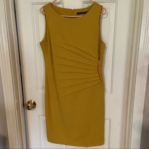 Golden sleeveless above knee length dress